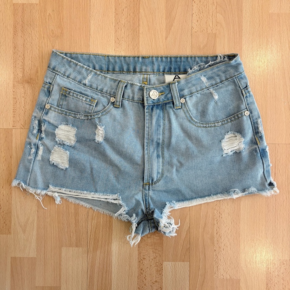 UNIF | High-rise Light Wash Distressed Ripped Denim Shorts